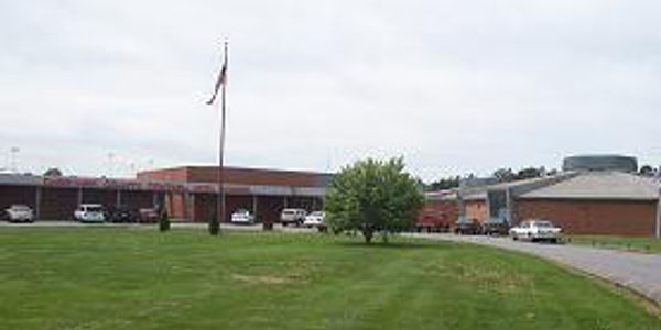 A view of a building and a lawn