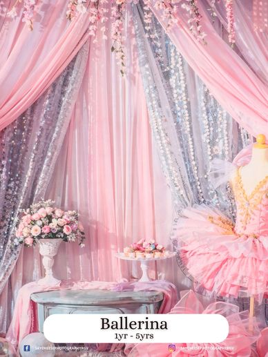 Delicate pink ballerina-themed backdrop with flowers and tutu dress.