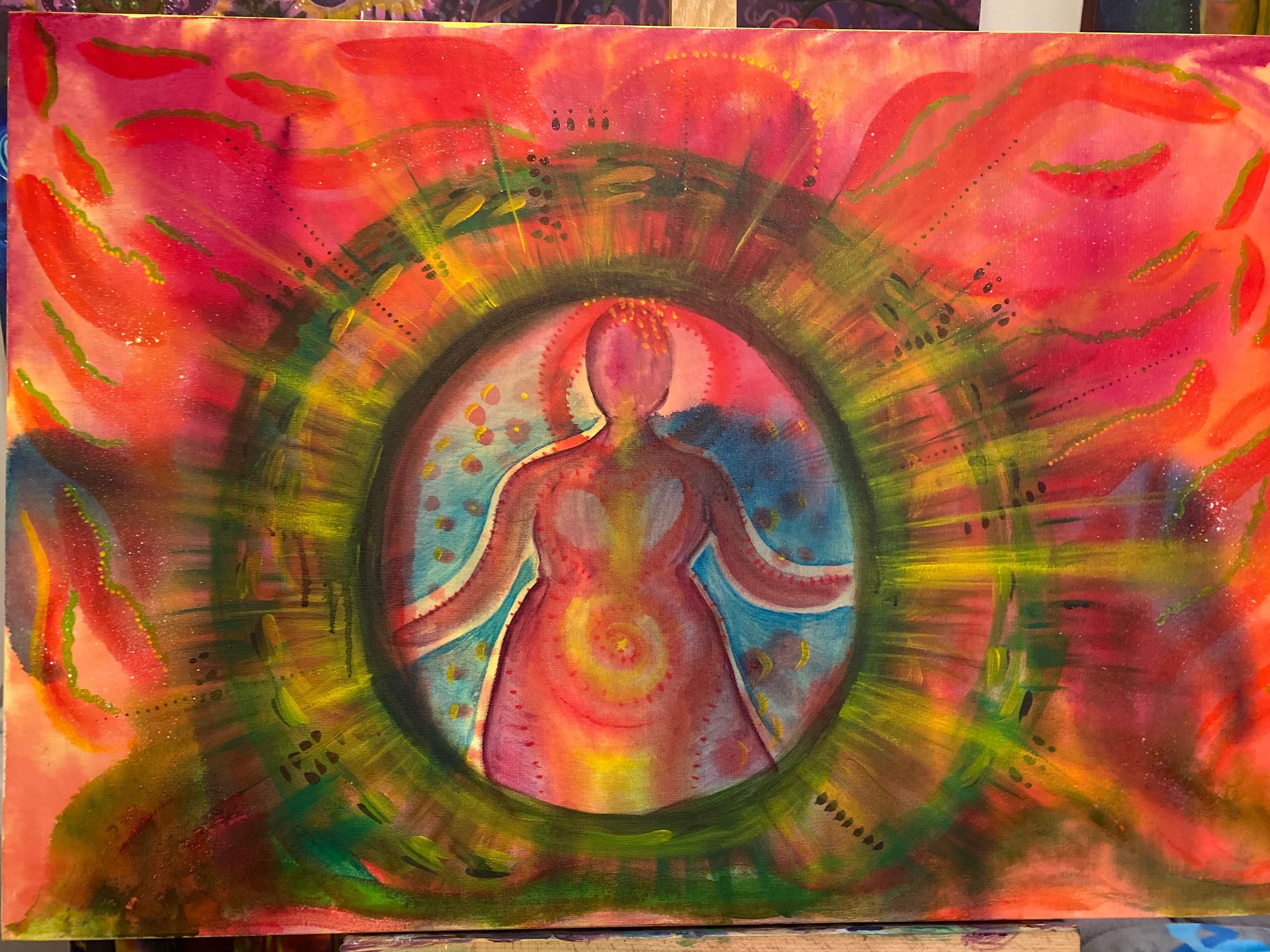 Colorful abstract painting of a meditating figure surrounded by vibrant energy.