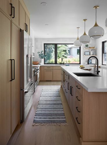 Custom kitchen cabinetry design by TKB Group. A  modern kitchen in Ontario with a large island.