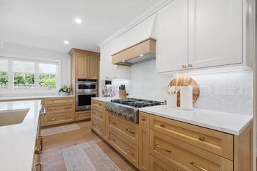 Custom kitchen cabinetry  design by TKB Group. A modern kitchen in Ontario with a large island.