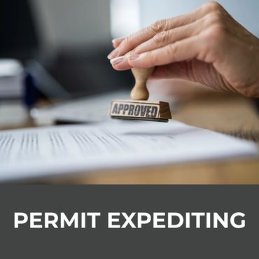 Hand stamping a document with an approved stamp symbolizing permit expediting.