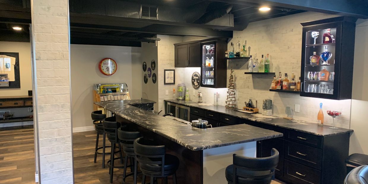 Custom Basement Bar.  Sprayed black ceiling.