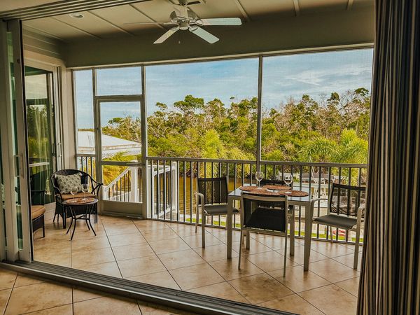 Amazing lanai with a wall of doors for those cool beach nights.