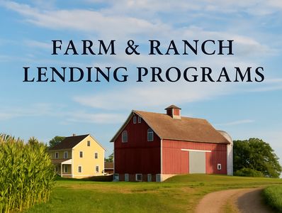 A scenic rural farm landscape under a sunny sky, featuring a classic barn, open pasture, and fencing