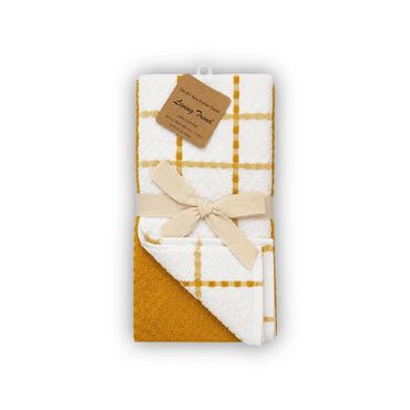 Set of cozy white and mustard kitchen towels with a checkered pattern tied with a beige ribbon.