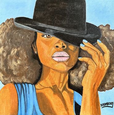 Erykah Badu with black hat