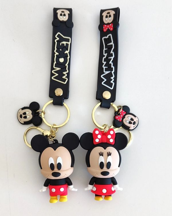 Mickey and Minnie Mouse keychains with matching straps and charms.
