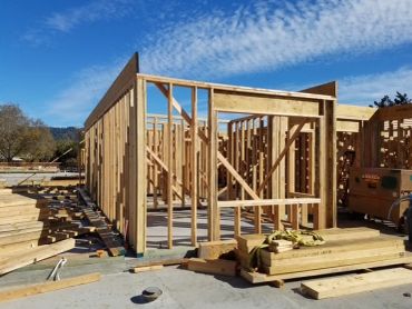 Wooden framing of a house under construction.