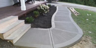 Curved Broom Finish Sidewalk with Picture Framing