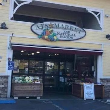 Exterior of AJ's Market natural foods store.