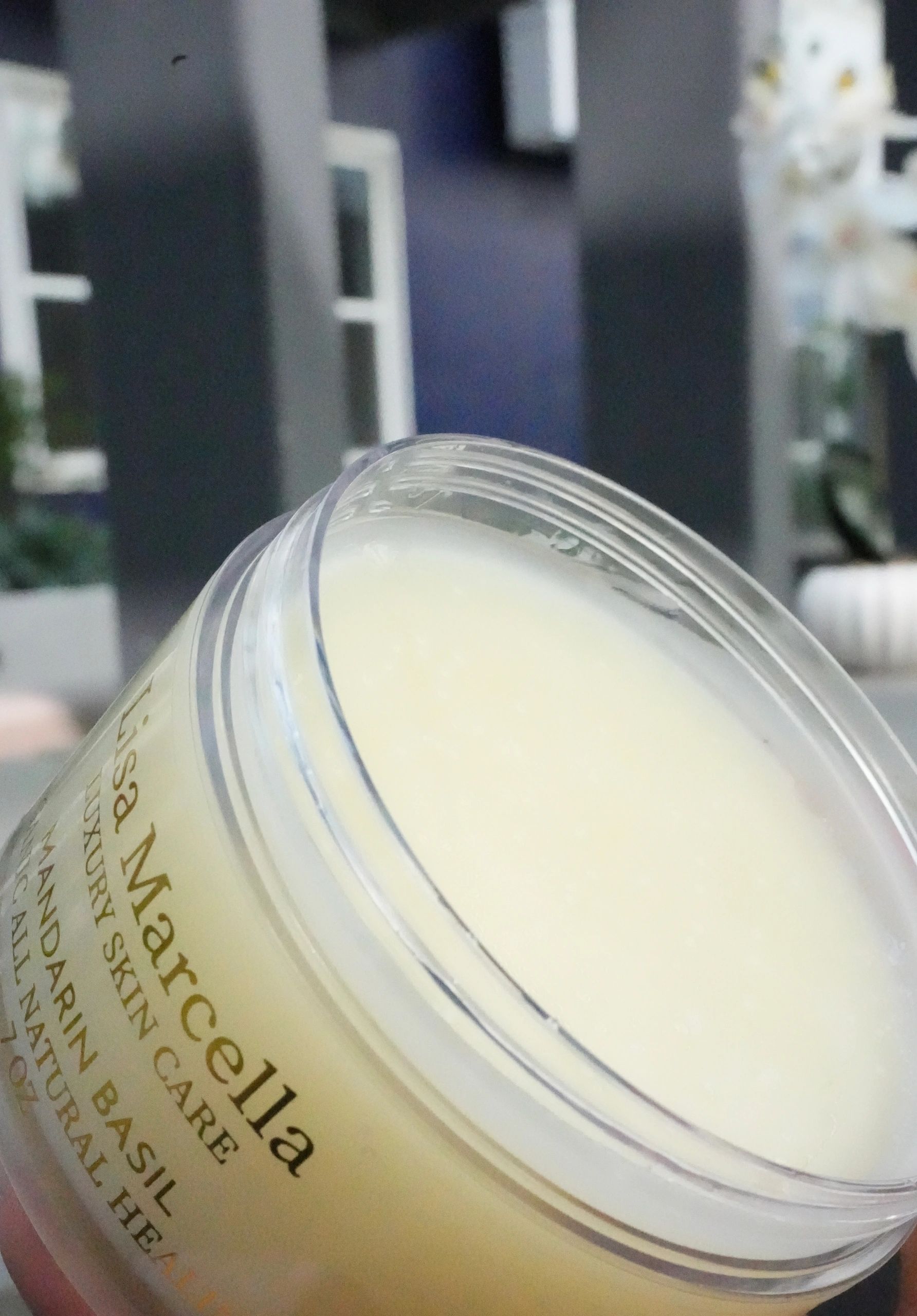 Close-up of a skincare cream jar.