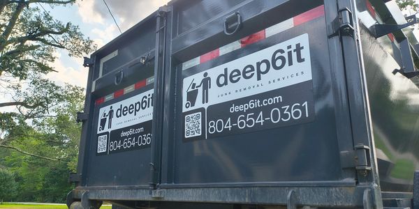 Close-up of a Deep6it dumpster loaded with clean, recyclable concrete from a sidewalk removall

