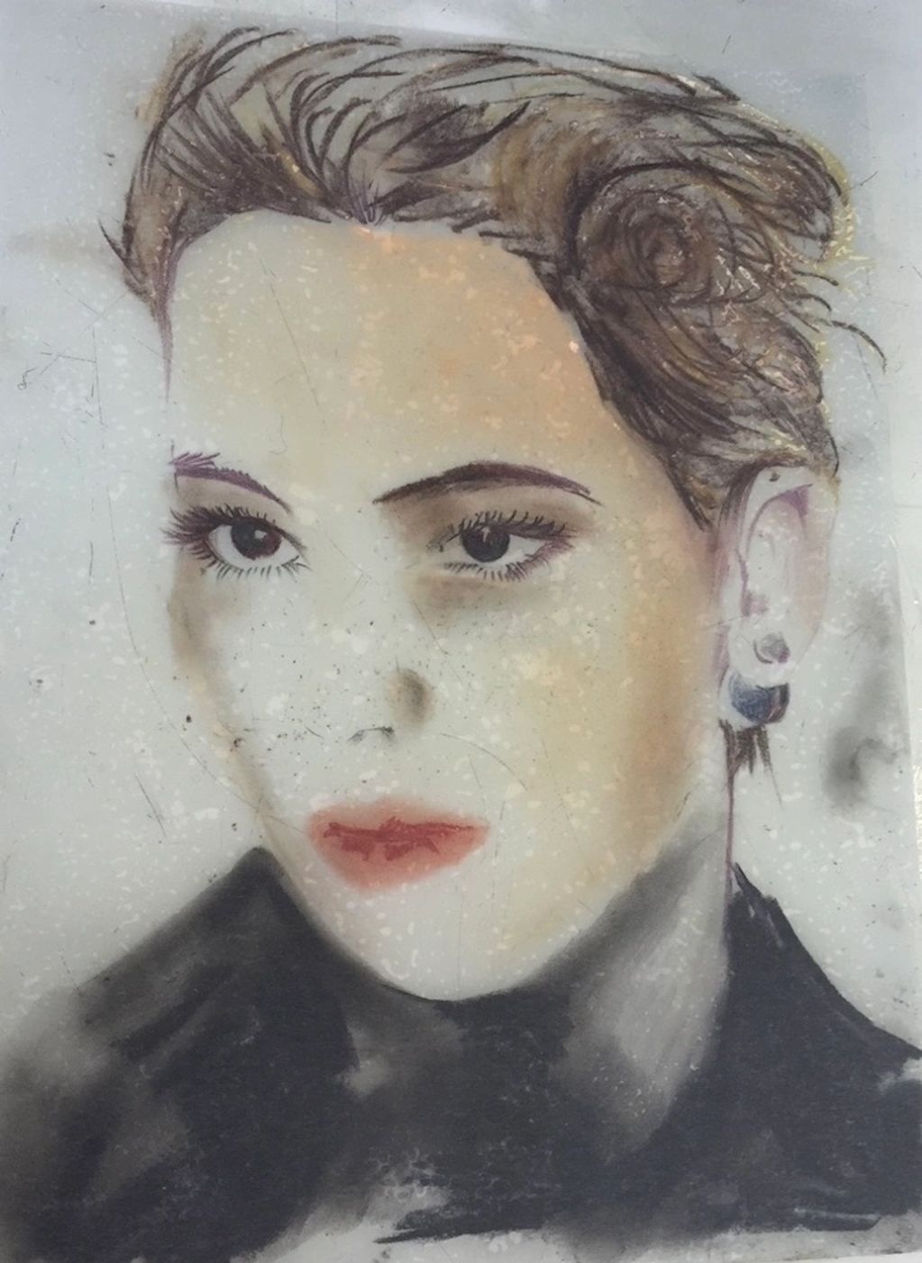 A stylized portrait of a woman with short hair and red lips.