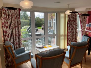 The old curtains in the sitting area at the care home 