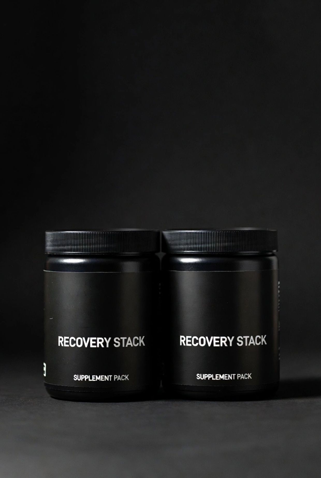 black bottles with white writing