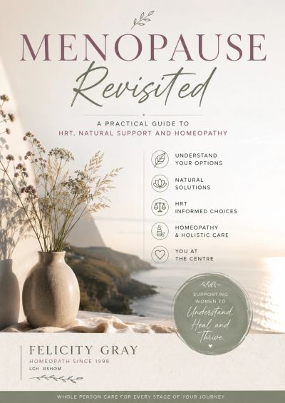 Book cover titled 'Menopause Revisited' focusing on practical guide, natural support, and homeopathy.