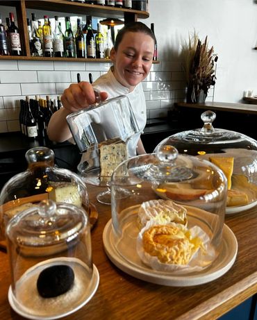 La Cachette's Chef Joanna inspects the latest delivery of amazing cheese and truffle. 