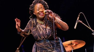 Sandra Bassett singing live