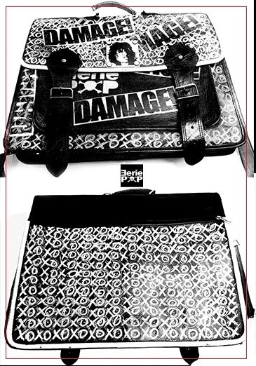 Two black and white bags with 'Damage' and patterned designs.