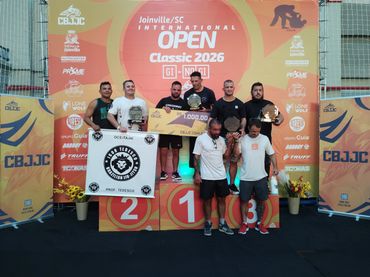 Winners celebrating on podium at Joinville/SC International Open Classic 2026.