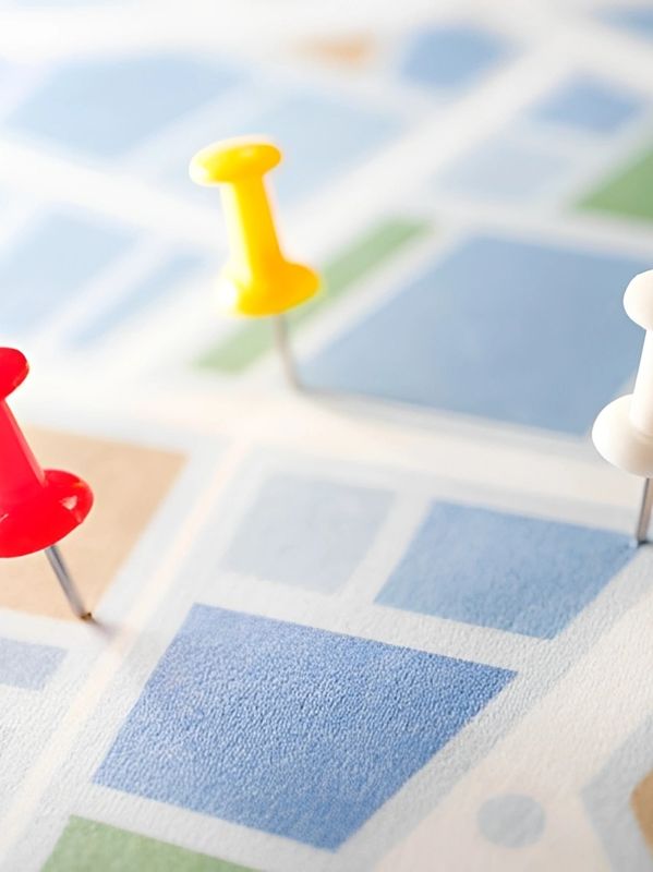 Colored pins on a map.