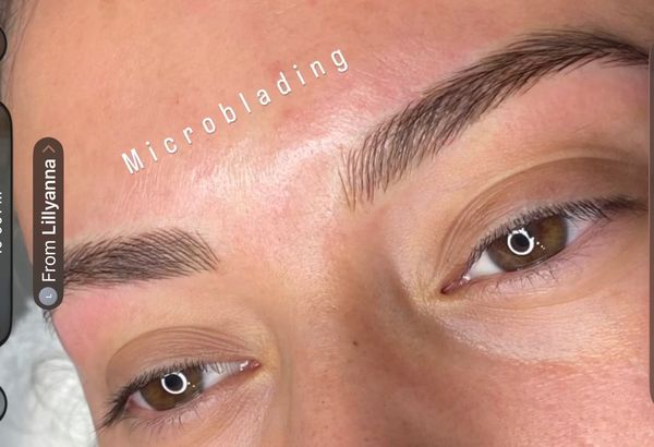 Close-up of well-groomed eyebrows after microblading.