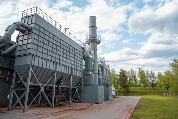 Dust collector / baghouse emissions from the building for air compliance under the Clean Air act 