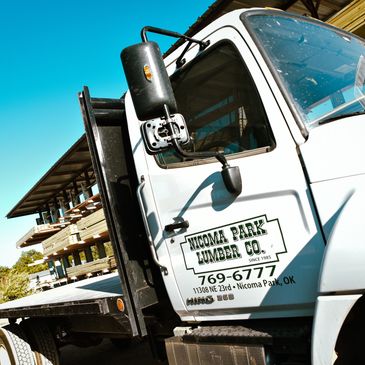 Truck for delivery at Nicoma Park Lumber & Hardware store displaying lumber yard near me in OKC