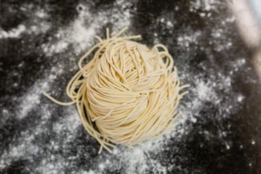 a making noodles on the restaurant