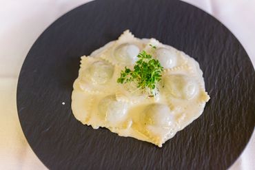 A white pasta and Coriander on the plate