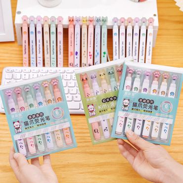 Colorful cat-themed gel pens displayed in sets with cute designs.