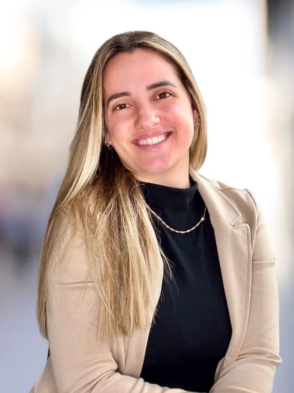 professional young woman smiling at you
