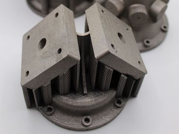 Additively manufactured Inconel718 components for a 500N ablatively lined GH2/GO2 apogee engine.