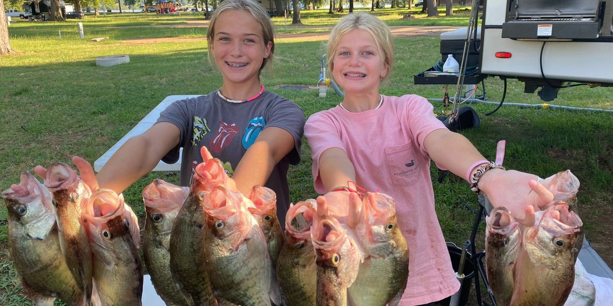 Girls laying the Hammer down
on some large crappie