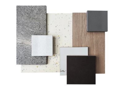A stylish arrangement of various textured and colored material samples.