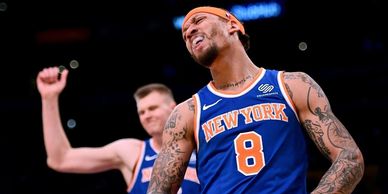 New York Knicks player showing intense emotion during a game.