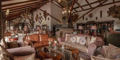 Cozy rustic lounge with vintage furniture and decor.