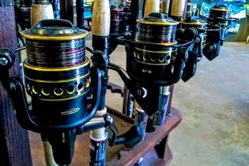 Reels displayed on rod combos.