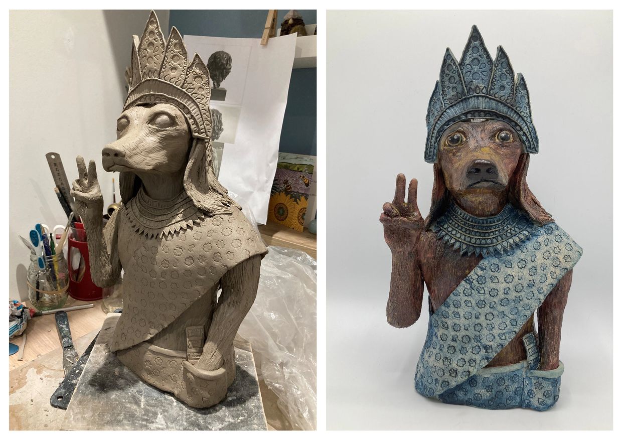 ceramic sculpture of a spaniel head and torso in blue Cambodian dress. Schiewe ceramics. 
