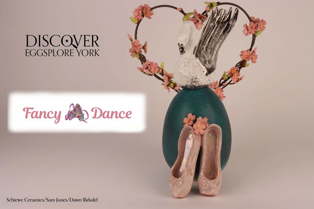 Schiewe Ceramic for Fancy Dance Shop Easter egg with swan on top, ballet shoes at the front.