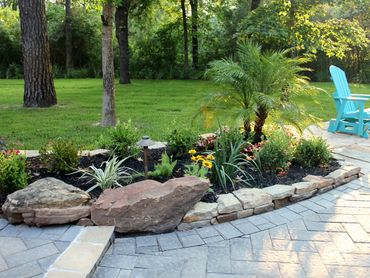 Custom plant and garden bed design for a low-maintenance Houston landscape.