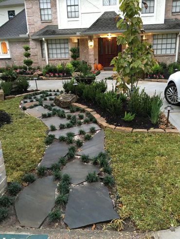 Flagstone sidewalk with textured surface and natural stone look