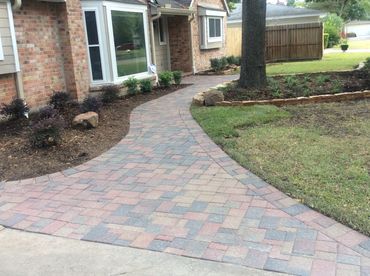 Curved walkway design enhancing curb appeal of suburban home