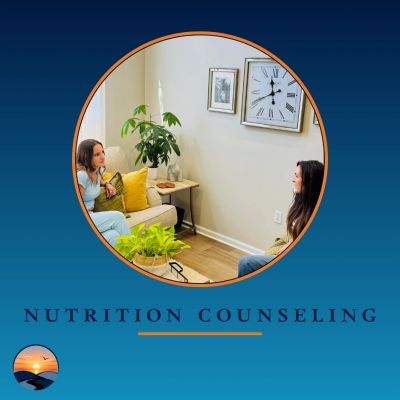 Two women engaged in nutrition counseling in a cozy room.