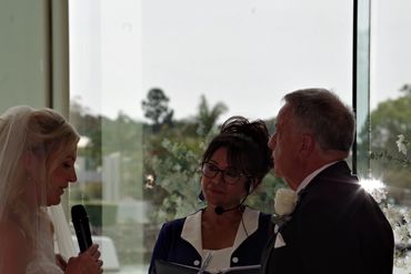 Mandi reading her personal vows  to Mark at the Sanctuary Cove Chapel