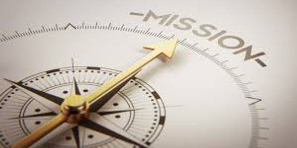Compass needle pointing to the word 'MISSION'.