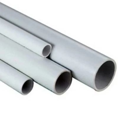 Various sizes of white PVC pipes arranged in a cluster.