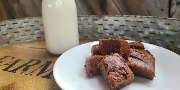 Nothing accompanies fudge better than a cold glass of goat milk.