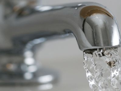 Photo of water running from a home faucet